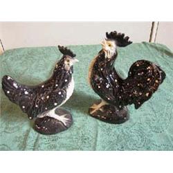 Pair of Porcelain Chicken and Rooster. Black and White glaze w/yellow eyes. Rooster does have a chip