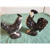 Image 1 : Pair of Porcelain Chicken and Rooster. Black and White glaze w/yellow eyes. Rooster does have a chip