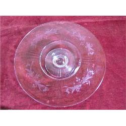 Glass Wheel cut and etched cake plateau. No chips. 2 1/4  high, 12  diameter. APV $25.00-$30.00....