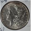 Image 1 : 1904   Morgan $  MS61 est  $90-$100