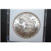 Image 1 : 1888 US Silver Morgan $1; MCPCG Graded MS63; EST. $70-100