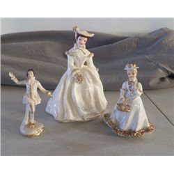 3- Porcelain  Figurines marked white & Gold 2- Lady's   1- man