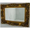 Image 1 : Heavily carved gold leaf mirror