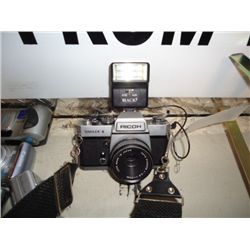 Ricoh camera w/flash and strap