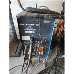 Miller arc welder w/feeder system