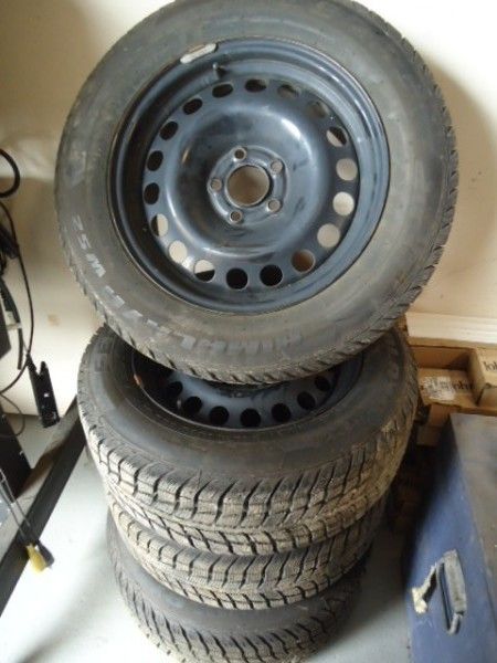 Set of 4 nearly new 215/60R16 winter tires and rims
