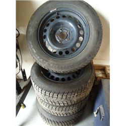 Set of 4 nearly new 215/60R16 winter tires and rims