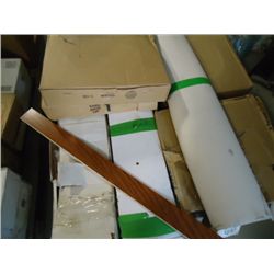 Pallet of laminet flooring, cushion flooring and rubber base board