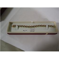 Gold plated sterling silver bracelet with genuine
