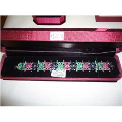 Sterling silver bracelet with genuine sapphires, emeralds