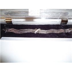 Joshua Lieff designer rhodium plated bracelet with clear Swarovski crystals
