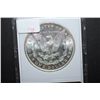 Image 2 : 1886 US Silver Morgan $1; MCPCG Graded MS63; EST. $50-70