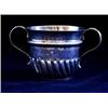 Image 1 : A QUEEN ANNE TWO HANDLED PORRINGER with curved lobes and fluting to lower half and a gadrooned band,