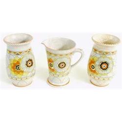 A CHARLOTTE RHEAD CROWN DUCAL JUG decorated Persian Rose pattern in stylised orange, red, yellow, bl