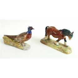 A ROYAL DOULTON PHEASANT No H12632, 6.75" high £100-150...