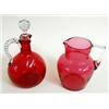 Image 1 : A VICTORIAN CRANBERRY GLASS JUG with clear glass strap handle, 6.5" high, together with a Victorian.