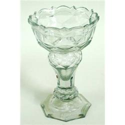 AN EARLY 19TH CENTURY CUT GLASS SWEET MEAT DISH the rim of the bowl cut with bevelled arches and spi