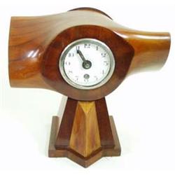 A VINTAGE PROPELLER CLOCK with eight day movement by H W Elliott Ltd, England, 10.25" high £125-175.