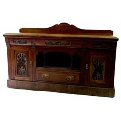 A LATE 19TH CENTURY AMERICAN WALNUT SIDEBOARD with shallow shaped back, the top with moulded edge ov