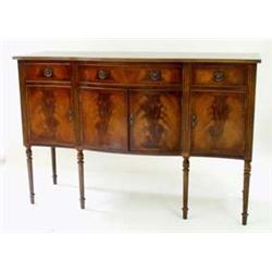 A MAHOGANY SERPENTINE SIDEBOARD by Bevan Funnell, the top cross banded and reeded to edge, having a.