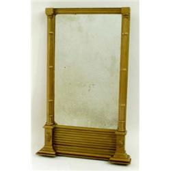 AN EARLY 19TH CENTURY GILT WALL MIRROR with breakfront pediment over a fluted frieze, with triple pi