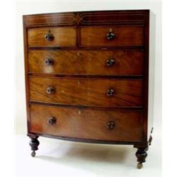 A 19TH CENTURY MAHOGANY AND STRING INLAID BOW FRONTED CHEST of two short and three long graduated dr