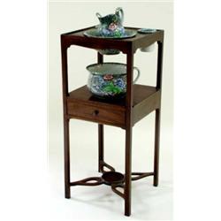A MAHOGANY SQUARE WASH STAND the top with undertier fitted a small drawer, on four champhered legs u