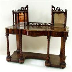 A FINE VICTORIAN BURR WALNUT DRESSING TABLE the swing mirror on pierced and scroll carved support, f