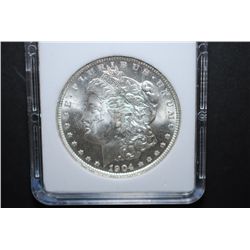 1904-O US Silver Morgan $1; MCPCG Graded MS61; EST. $50-70