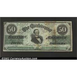 1861 $50 Black with green overprint; Jefferson Davis, T-16, VF, CC. Some soiling is evident near the