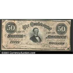 1864 $50 Portrait of Jefferson Davis; Black with Reddish Overprint, T-66, XF. A broadly margined exa