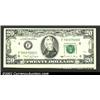 Image 1 : Fr. 2077-F $20 1990 Federal Reserve Note. Gem Crisp Uncirculated. An interesting miscutting, leaving