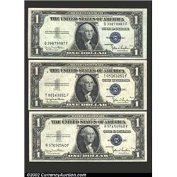 A group of three 1935D $1 Silver Certificates, (2) Fr-1613N's and a Fr-1613W. The two Narrows are bo