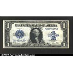 1923 $1 Silver Certificate, Fr-237, CU. A boldly embossed example with some minor smudging in the le