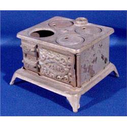 Lot 260: Miniature Cast Iron Store and Toy Lot