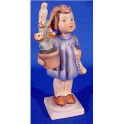 Lot 403: Hummel Figure of Girl with Flowers and Horn
