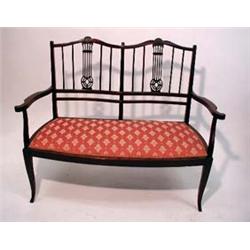 An Edwardian mahogany two-seater settee