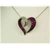 Image 1 : Pleasant 10K WG Ladies Heart Shaped NecklacePave set with 22 round diamonds and rubies  weighing app