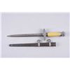 Image 1 : German WWII Luftwaffe Dagger & Scabbard2nd model Officers, has an orange celluloid  handle, the blad