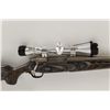Image 2 : Mossberg Mdl 4x4 Cal .300 SN:BA091184Bolt action sporting rifle, 24" barrel,  stainless steel with c