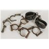 Image 1 : Collection of 4 Antique HandcuffsIncludes 3 metal handcuffs, rusty decorator  type and 1 pair of  le
