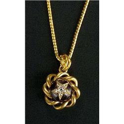 A Victorian gold, garnet and diamond pendant, centred with a round garnet with an applied old-cut an