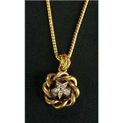 A Victorian gold, garnet and diamond pendant, centred with a round garnet with an applied old-cut an