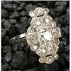 Image 1 : A diamond panel ring, the cartouche shaped panel centred with an Edwardian-cut stone approx. 0.85cts