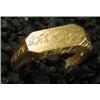 Image 1 : A Continental signet ring, the canted rectangular head, facetted bezel and shoulders each engraved w