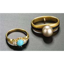A late Victorian gold, turquoise and diamond three stone ring, centred with a round cabochon turquoi