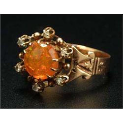 A fire opal and rose diamond cluster ring, centred with a round cabochon fire opal, approx. 9mm diam
