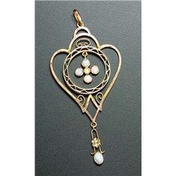 An Edwardian gold, opal and half-pearl openwork pendant of stylised open heart-shaped design with a.