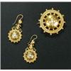 A pair of Victorian gold and half pearl pendent earrings and a brooch in Etruscan style, each round.
