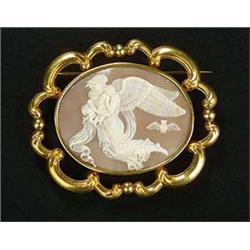 A Victorian shell cameo oval brooch, depicting Night carrying two children with an owl in the backgr